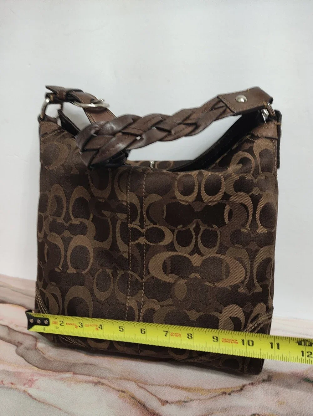 Coach signature fabric